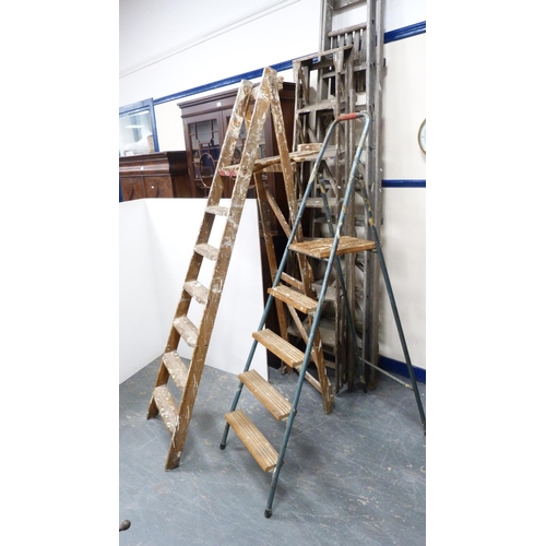 285 - Three sets of wooden stepladders, various sizes, and another set.  (4)