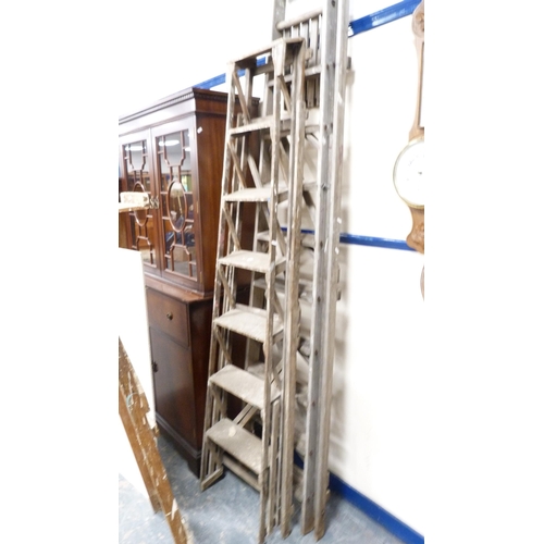 285 - Three sets of wooden stepladders, various sizes, and another set.  (4)