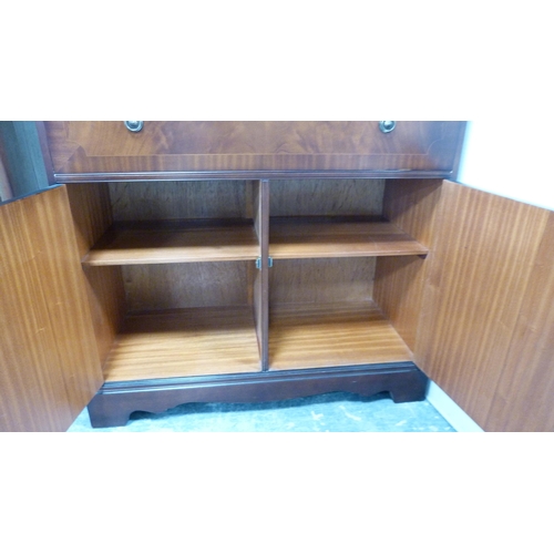 286 - Mahogany secretaire bookcase, glazed upper section with cupboard below.