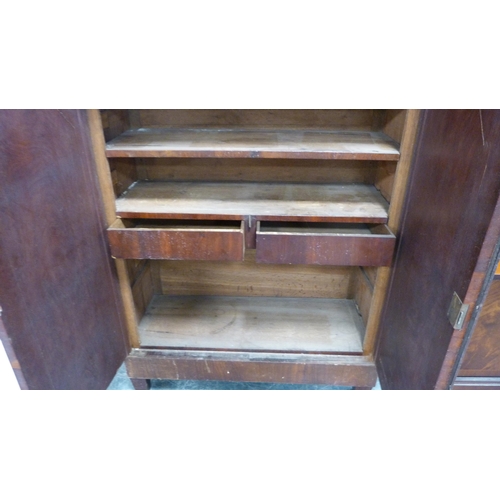 287 - 19th century mahogany bookcase with two panel doors.