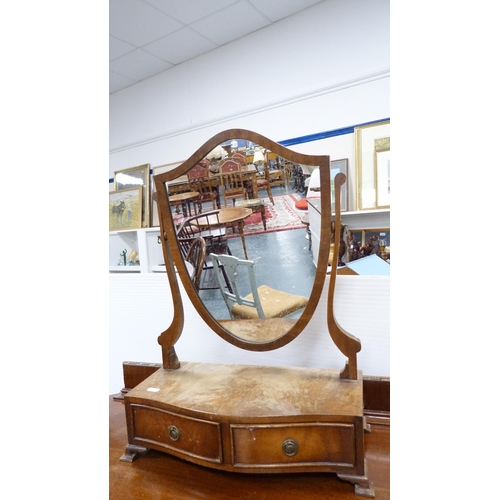 292 - Mahogany three-drawer bedroom chest and a mahogany shield-shaped dressing mirror.  (2)