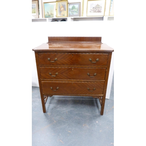 292 - Mahogany three-drawer bedroom chest and a mahogany shield-shaped dressing mirror.  (2)