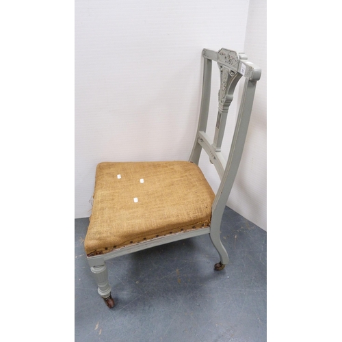 293 - Late Victorian painted nursing chair on castors.