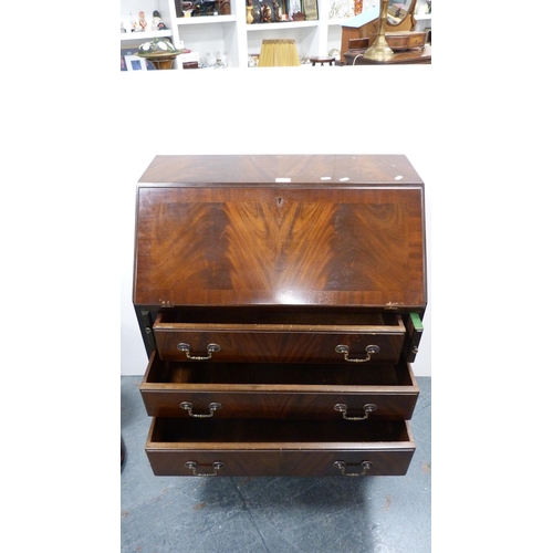 296 - Reproduction mahogany writing bureau.