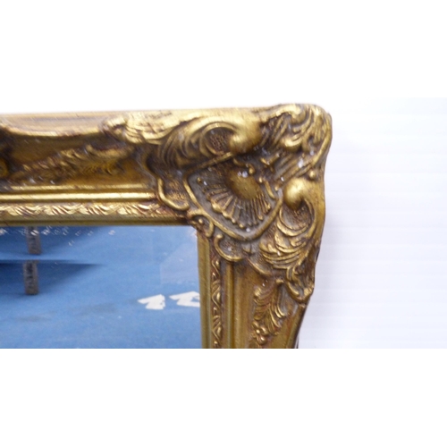 30 - Victorian-style gilt-framed wall mirror.