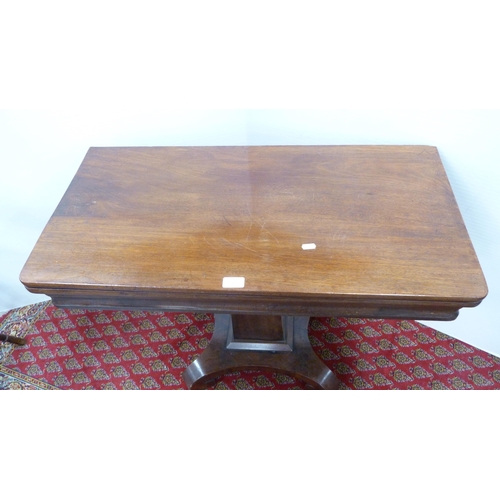 321 - Early Victorian mahogany fold-over card table on platform base.