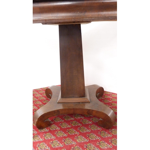 321 - Early Victorian mahogany fold-over card table on platform base.