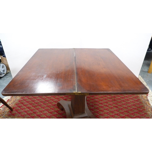 321 - Early Victorian mahogany fold-over card table on platform base.