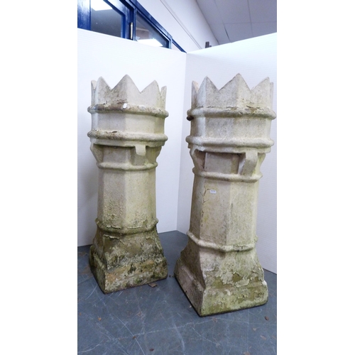 325 - Two castellated chimney pot planters.