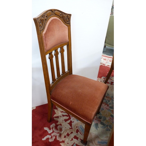 332 - Oak extending dining table and a set of six Art Nouveau-style oak dining chairs, with later upholste... 