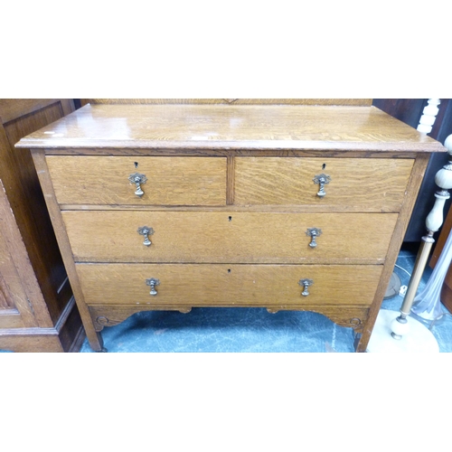 338 - 1930s/40s oak chest of two short and two long drawers.