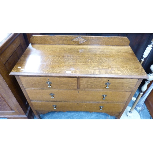 338 - 1930s/40s oak chest of two short and two long drawers.