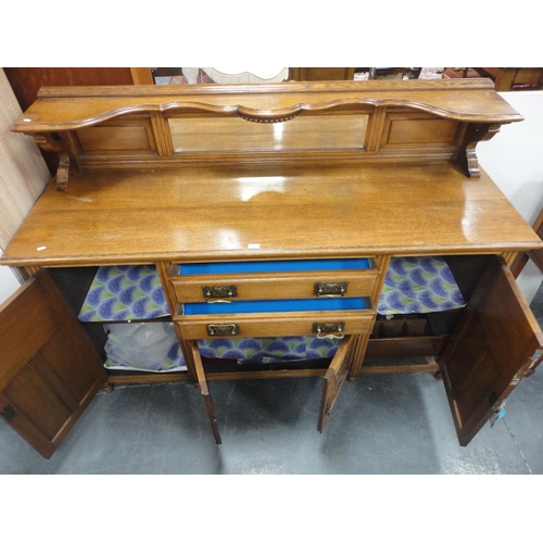 344 - Edwardian oak mirror-back sideboard with brass handles, assorted drawers and cupboards.