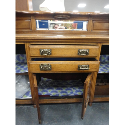 344 - Edwardian oak mirror-back sideboard with brass handles, assorted drawers and cupboards.