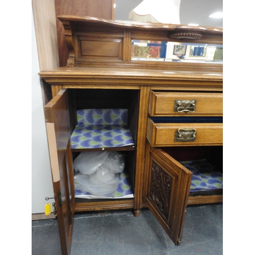 344 - Edwardian oak mirror-back sideboard with brass handles, assorted drawers and cupboards.