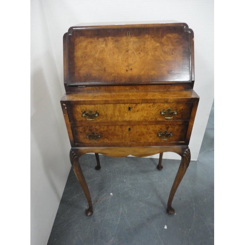 345 - Lady's figured walnut writing bureau on cabriole supports.