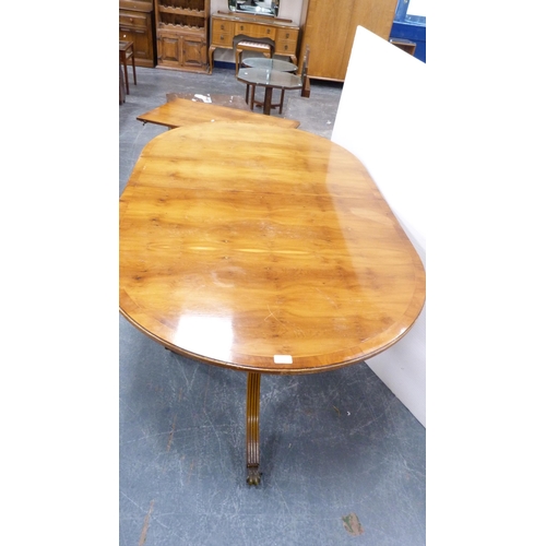 346 - Modern yew wood dining table with additional leaf and a modern yew wood serpentine sideboard.  (2)