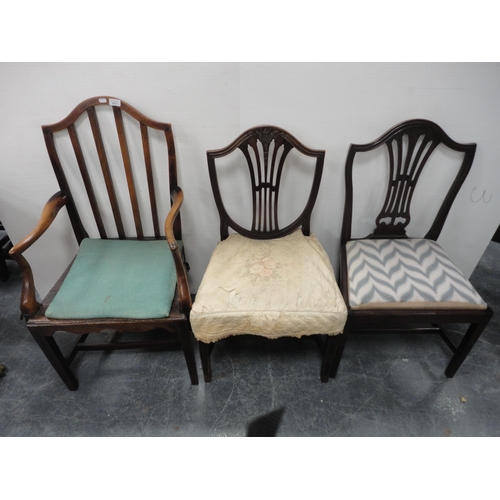 347 - Two antique mahogany Hepplewhite-style shield-back dining chairs, one with a wheatsheaf motif, and a... 