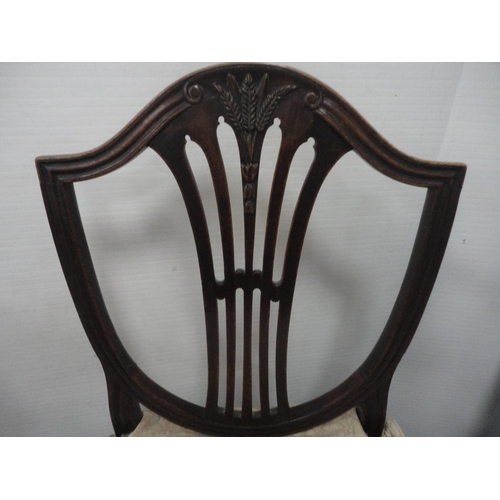 347 - Two antique mahogany Hepplewhite-style shield-back dining chairs, one with a wheatsheaf motif, and a... 