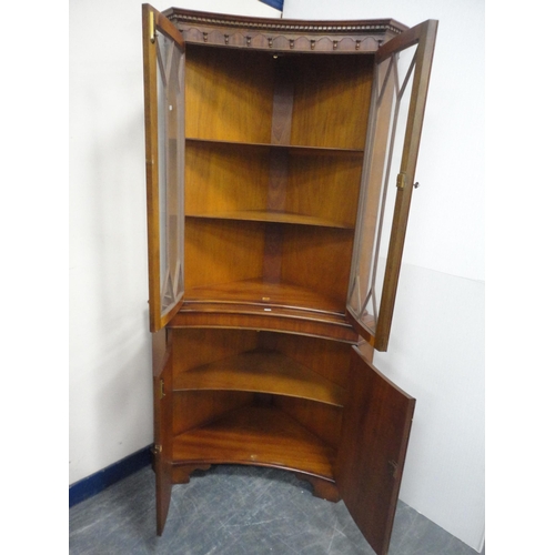 349 - Reproduction concave glazed corner cabinet.