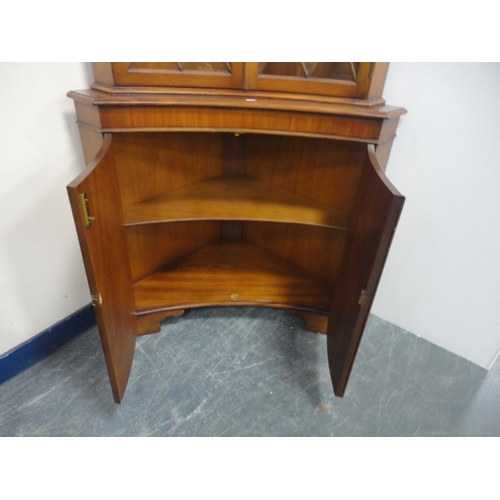 349 - Reproduction concave glazed corner cabinet.