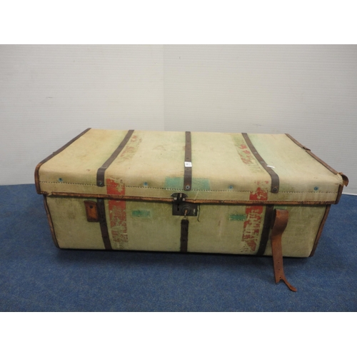 364 - Canvas and metal-bound travel trunk.