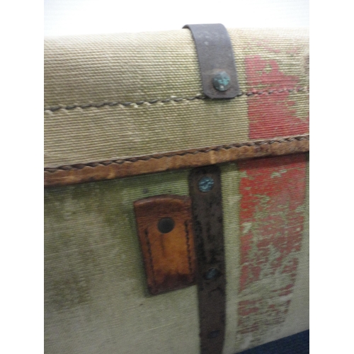 364 - Canvas and metal-bound travel trunk.