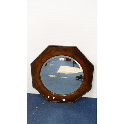 48 - Oak octagonal wall mirror.