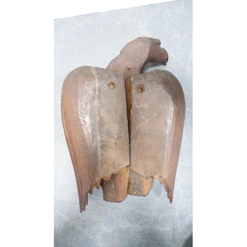 62 - Pair of grotesque wall hanging carved wooden eagle figures.  (2)