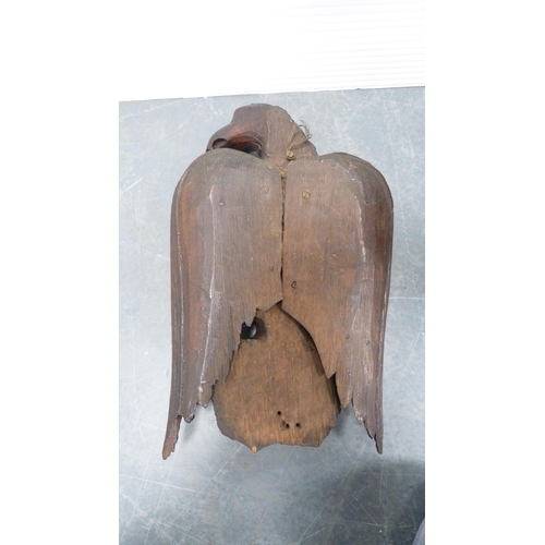 62 - Pair of grotesque wall hanging carved wooden eagle figures.  (2)