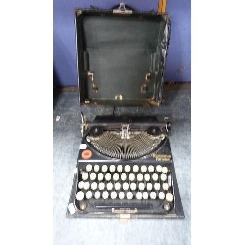 63 - Remington typewriter and an Imperial typewriter, both cased.  (2)