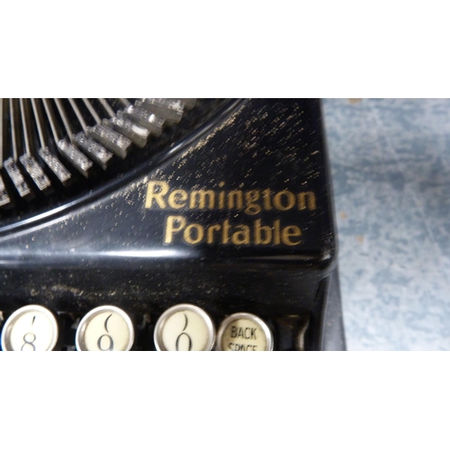 63 - Remington typewriter and an Imperial typewriter, both cased.  (2)