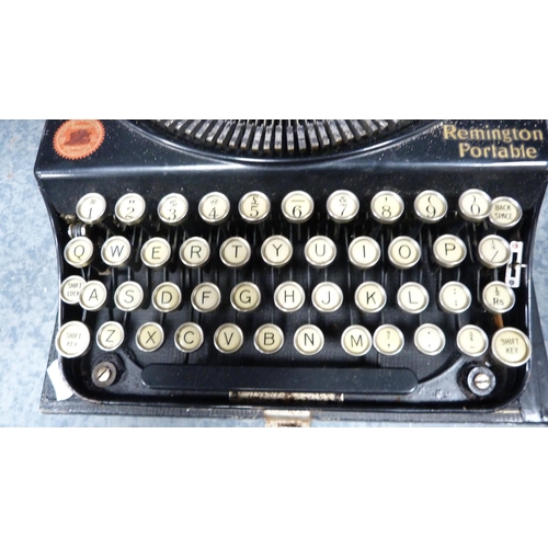 63 - Remington typewriter and an Imperial typewriter, both cased.  (2)