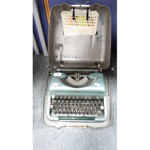 63 - Remington typewriter and an Imperial typewriter, both cased.  (2)