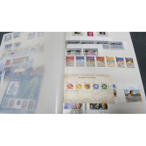 64 - Six assorted folders containing first day covers and postcard albums.