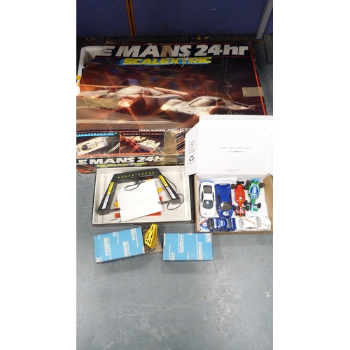 69 - Scalextric Le Mans set, assorted cars, accessories, model racing cars.