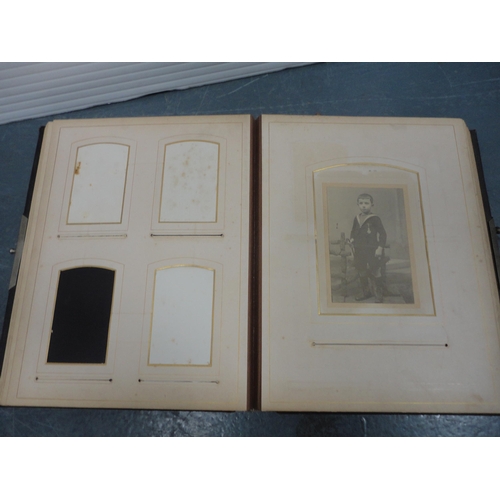 79 - Two Edwardian tooled photograph albums and contents.