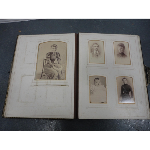 79 - Two Edwardian tooled photograph albums and contents.