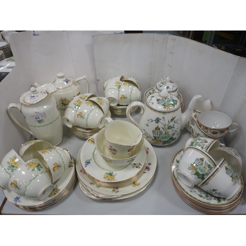 83 - Royal Doulton part tea set with floral decoration and a Coalport 'Kowloon' pattern part tea set.