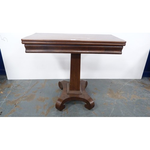 321 - Early Victorian mahogany fold-over card table on platform base.