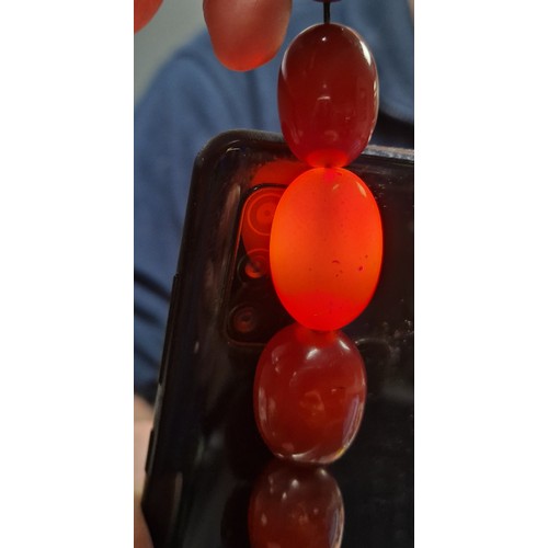 83 - Cherry amber / bakelite beaded necklace, 54g gross weight