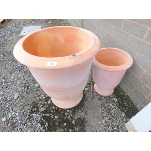 555 - Two large terracotta garden planters.