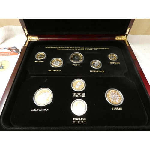 522 - London Mint Office. Cased set of 24ct gold plated British coinage to include shillings, threepences,... 