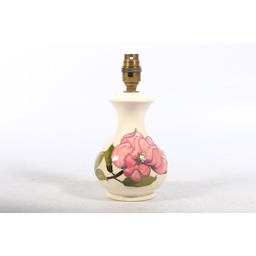 275 - Moorcroft Hibiscus pottery lamp base, max H22.5cm.