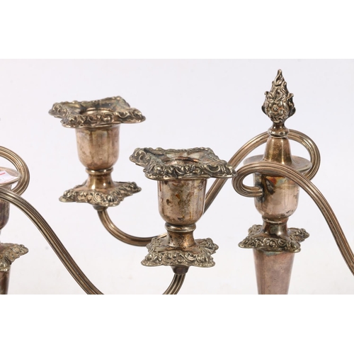 69 - Pair of silver plated twin branch candelabrum.