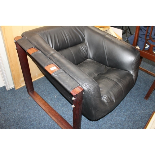 716 - Mid Century wooden framed leather tub chair in the manner of Percival Lafer. 89cm wide.