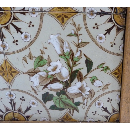 225 - Set of four Victorian fireplace tiles decorated with floral bouquets and circular geometric panels, ... 