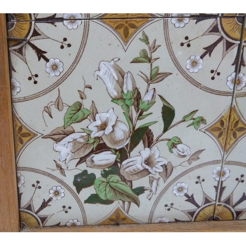 225 - Set of four Victorian fireplace tiles decorated with floral bouquets and circular geometric panels, ... 