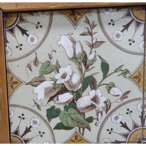 225 - Set of four Victorian fireplace tiles decorated with floral bouquets and circular geometric panels, ... 