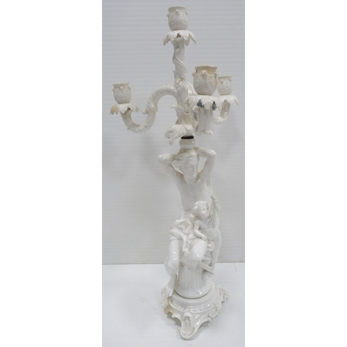 227 - In the Manner of MeissenNear pair of 19th century blanc de chine glazed Rococo-inspired candelabra o... 